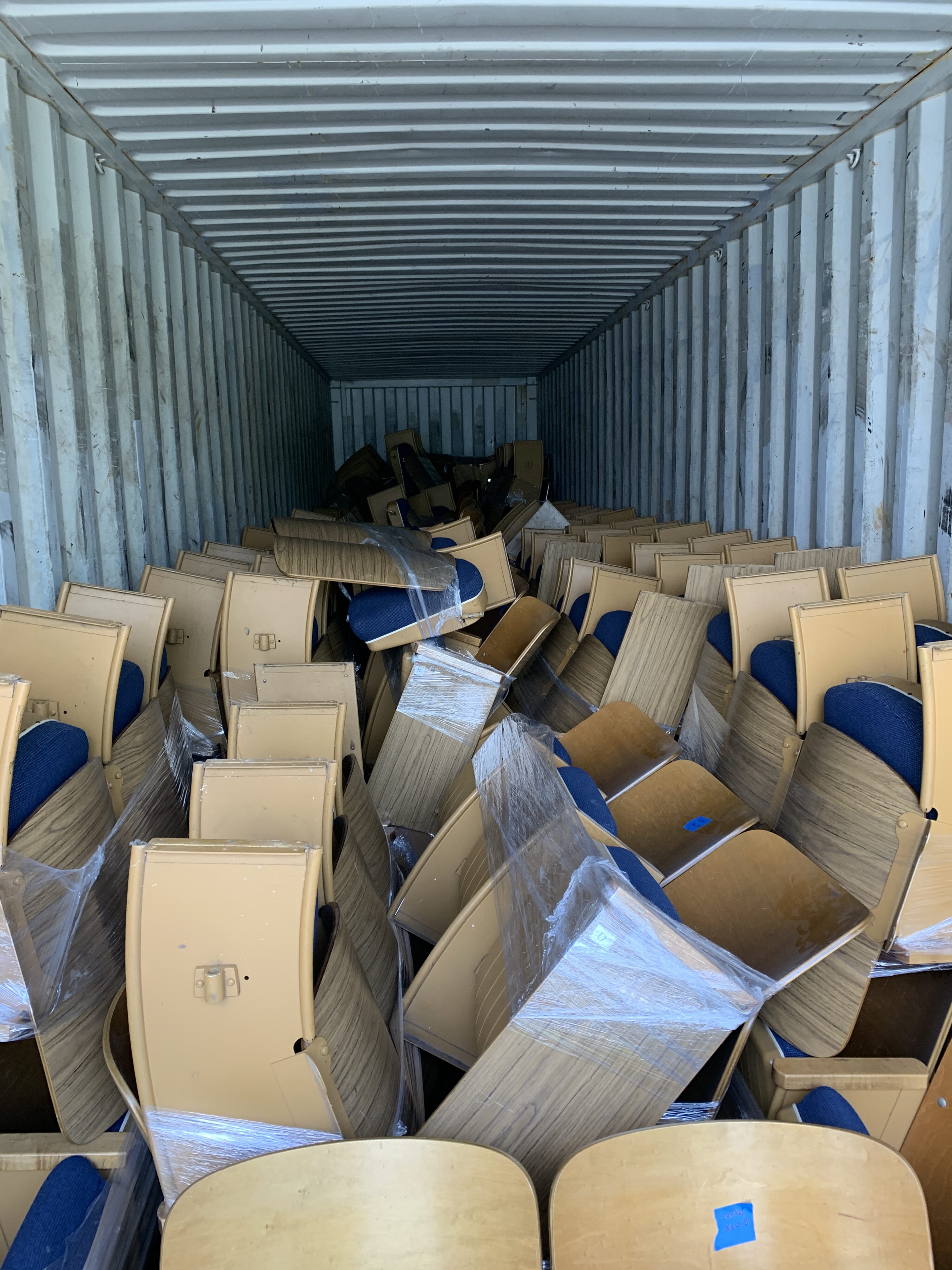 armchairs in container